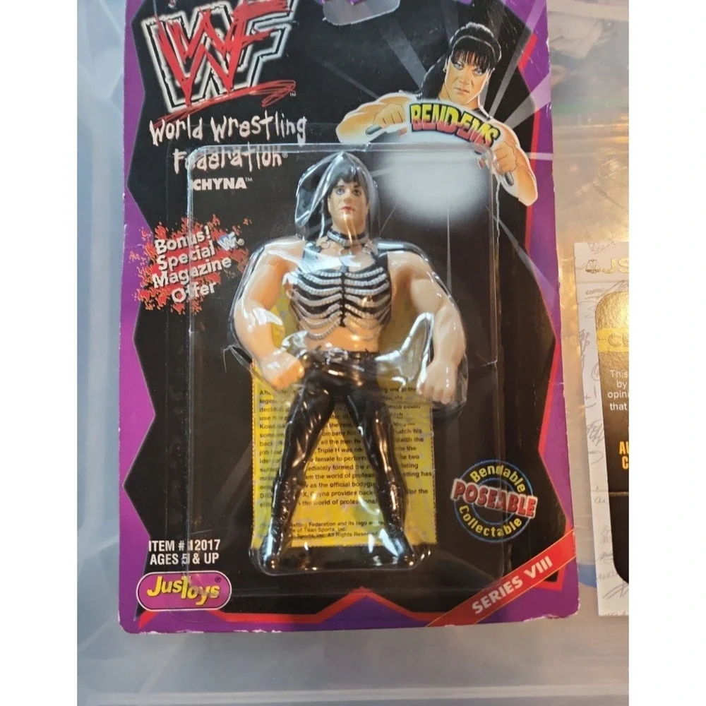 Autographed WWF CHYNA BEND-EMS FIGURE IN ORIGINAL PACKAGE WITH COA